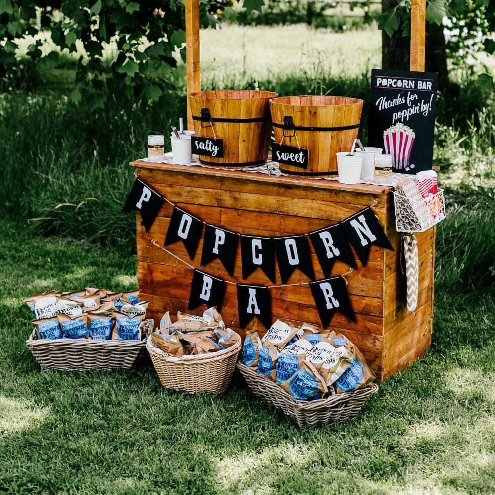Popcorn Bar For Wedding // Bride In Floral Dress By Stephanie Allin Festival Wedding With Food Trucks &amp; Outdoor Ceremony With Geo Dome Tent Baya Hire Epic Love Story Photography