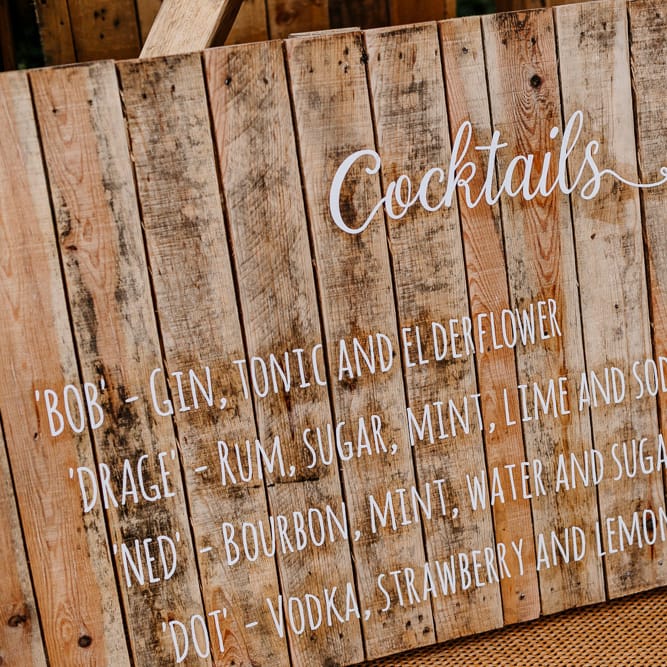Signature Cocktails For Wedding // Bride In Floral Dress By Stephanie Allin Festival Wedding With Food Trucks &amp; Outdoor Ceremony With Geo Dome Tent Baya Hire Epic Love Story Photography