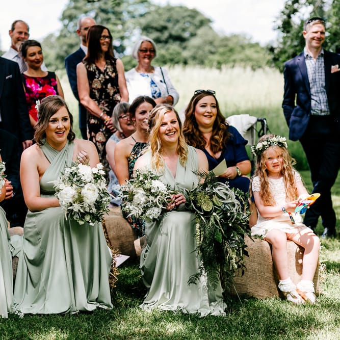 Bridesmaids In Sage Green Wrap Dresses // Bride In Floral Dress By Stephanie Allin Festival Wedding With Food Trucks &amp; Outdoor Ceremony With Geo Dome Tent Baya Hire Epic Love Story Photography