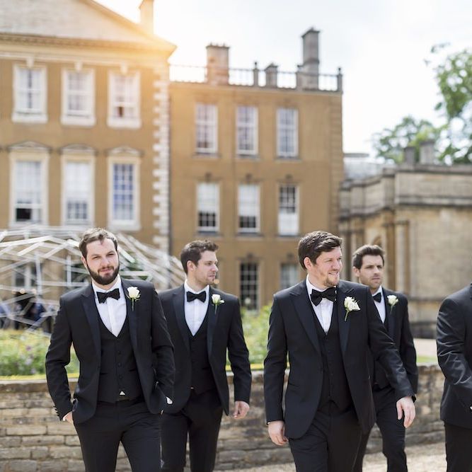 Groom and his groomsmen wearing black tie at Aynhoe Park wedding