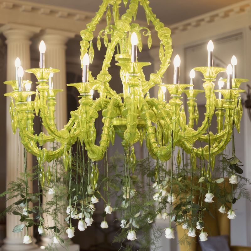 Statement chandelier with white rose decor