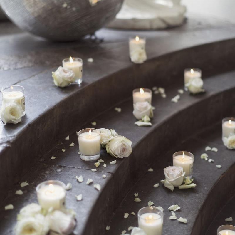 Jo Malone candles and white rose decor