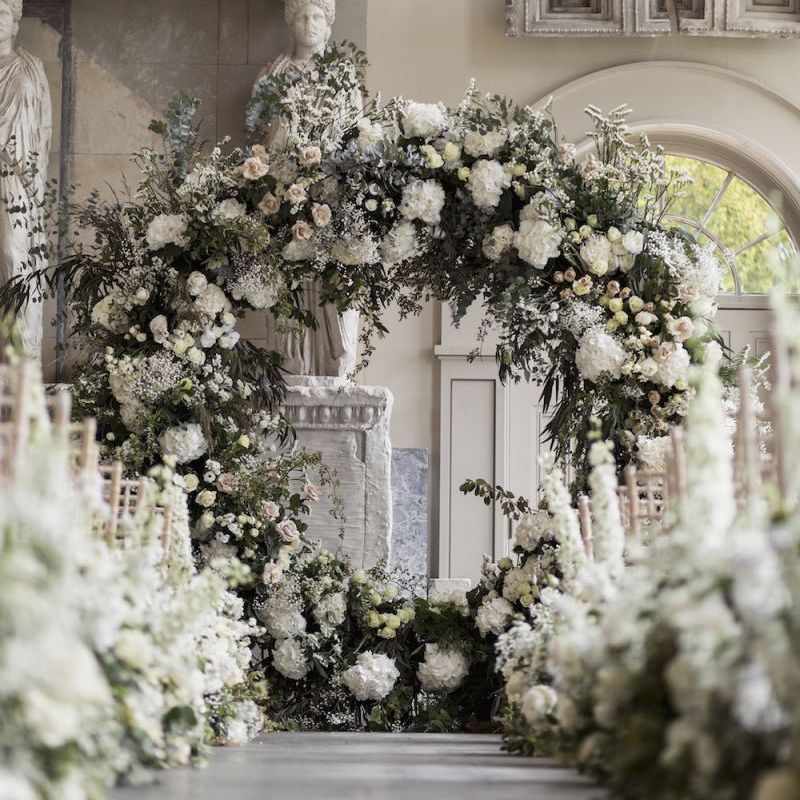 Beautiful white floral aisle decor