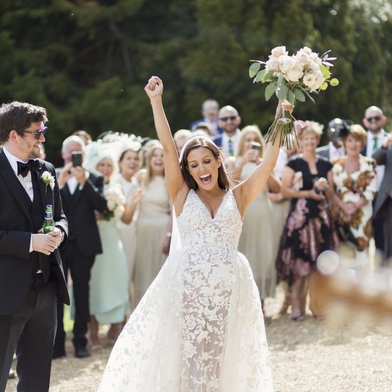 Bride wearing stunning Zuhair Murad dress with laced detail