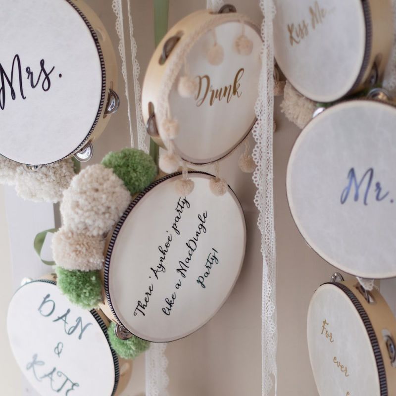Personalised tambourines  hung with lace