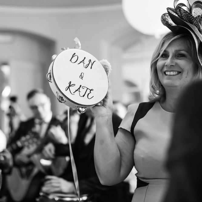 Personalised tambourine at party filled reception