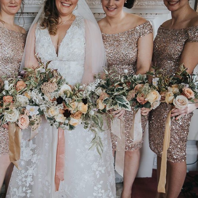 Bridal Party In Gold Bridesmaid Dresses With Bouquets