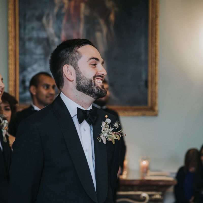 Grooms Smiles As Bride Walking Down The Aisle