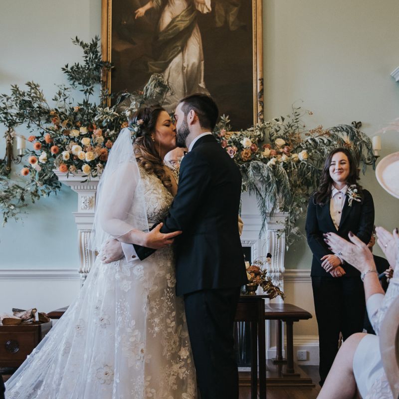 Bride and Groom Kiss After Exchanging Vows