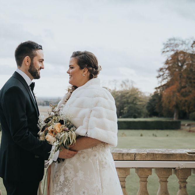 Bride Wears Faux Fur Cover Up For Winter Wedding
