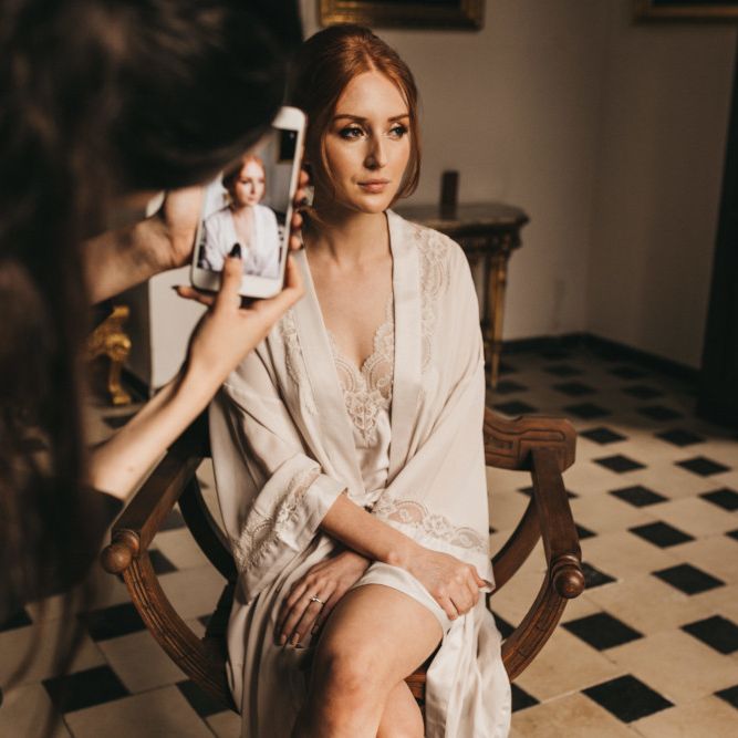 Wedding Morning Bridal Preparations with Bride in Lace Getting Ready Robe and Garter