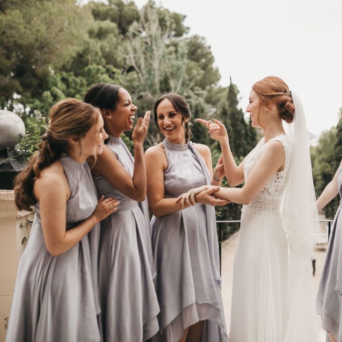 Bride and Bridesmaids Laughing on the Wedding Morning