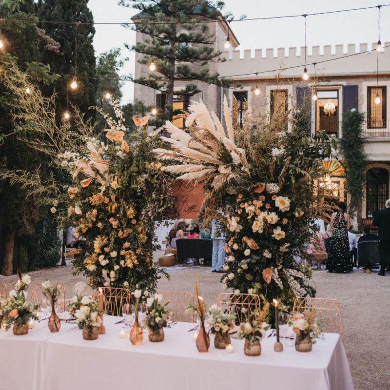 Intimate Top Table with Floral Arch Backdrop