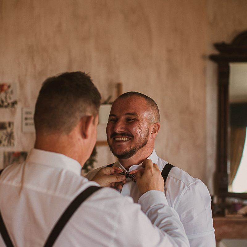 Groomsmen on the Wedding Morning in Braces and Bow Ties featured on escape to the chateau