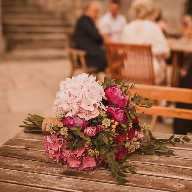 Pink Bridal Bouquet with Hydrangeas, Roses and Foliage featured on escape to the chateau
