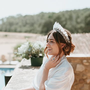 Bride In Feather Headdress With Hair Up For Outdoor Wedding