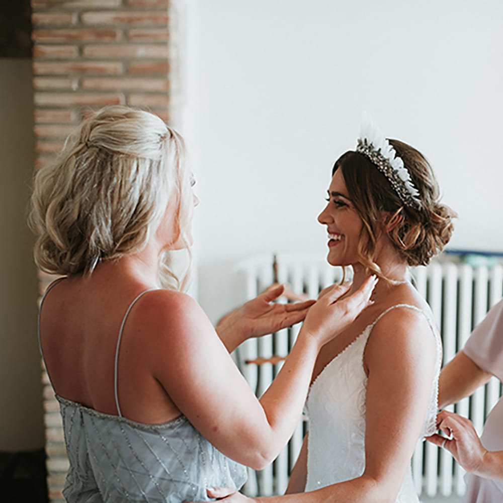 Bridal Preparations With Feather Headdress