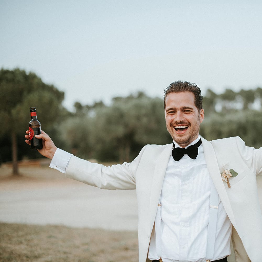 Groom In White Dinner Jacket and Bow Tie