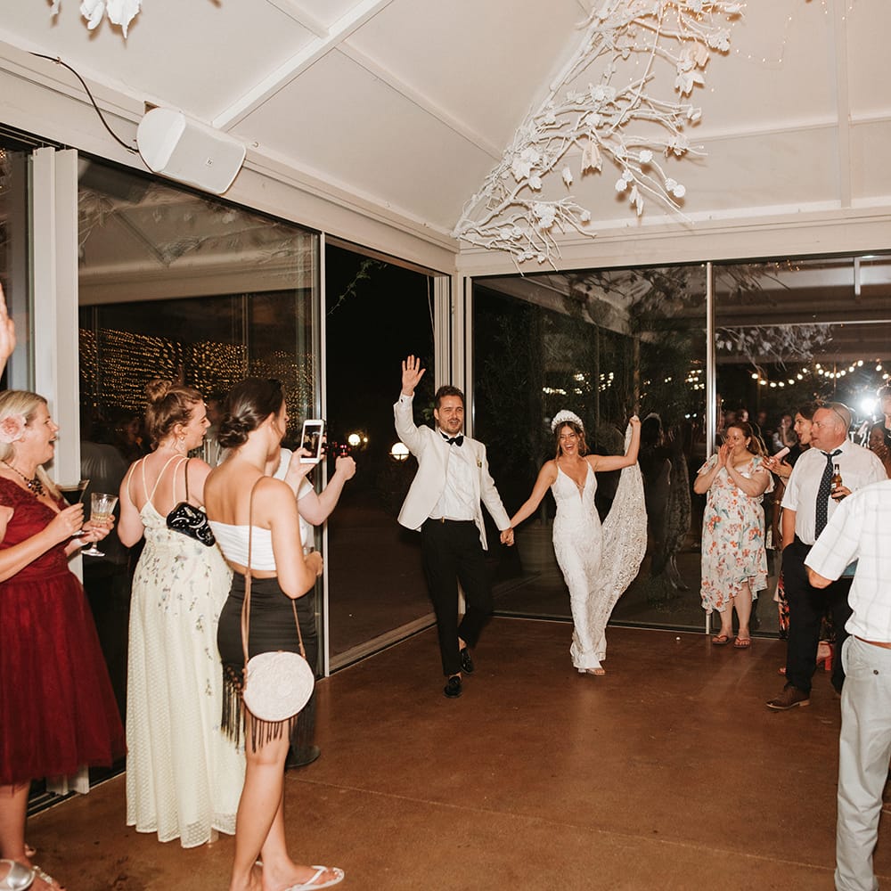 Bride and Groom Enter Room As Husband And Wife