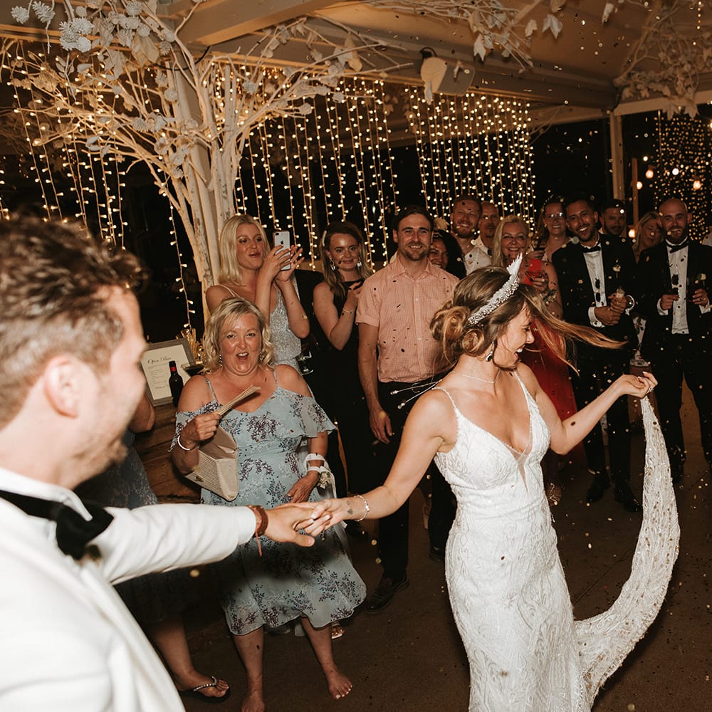 Bride In Feather Headdress For First Dance