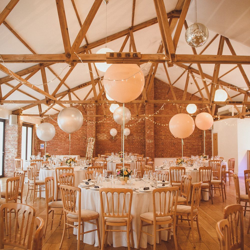 Rustic Barn Reception with Plant Pot Centrepieces &amp; Giant Balloons | Fusion Rustic Indian Country Wedding at The Green Cornwall | Matt Penberthy Photography