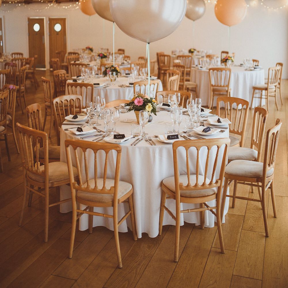 Rustic Barn Reception with Plant Pot Centrepieces &amp; Giant Balloons | Fusion Rustic Indian Country Wedding at The Green Cornwall | Matt Penberthy Photography