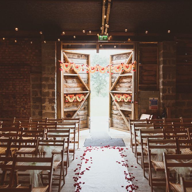 Rustic Barn Indian Ceremony with Festoons, Petals &amp; Colourful Flowers | Fusion Rustic Indian Country Wedding at The Green Cornwall | Matt Penberthy Photography