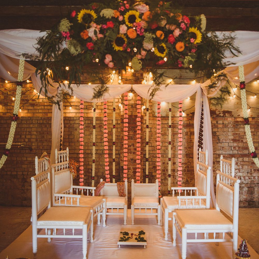 Mandap Indian Altar with Colour Floral Arrangement | Fusion Rustic Indian Country Wedding at The Green Cornwall | Matt Penberthy Photography