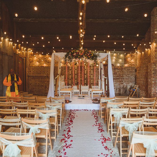 Mandap Indian Altar with Colour Floral Arrangement | Fusion Rustic Indian Country Wedding at The Green Cornwall | Matt Penberthy Photography