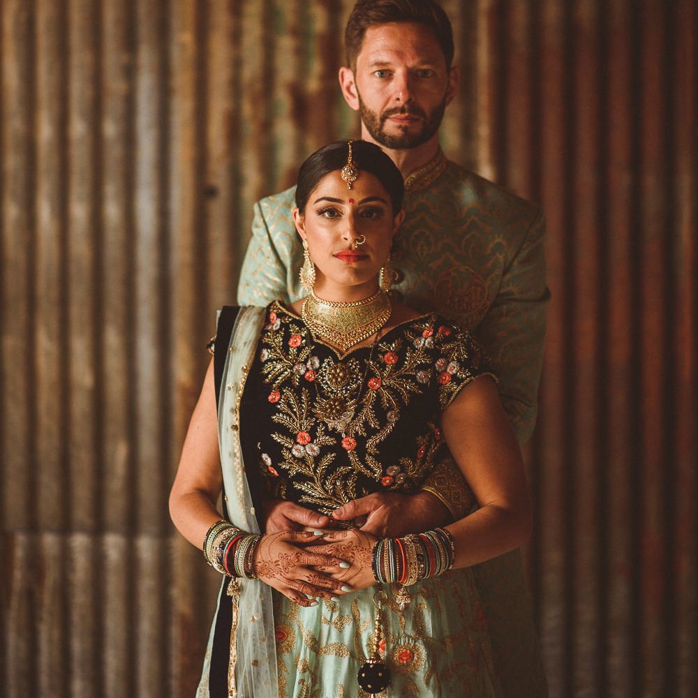 Bride &amp; Groom in Traditional Indian Wedding Attire | Fusion Rustic Indian Country Wedding at The Green Cornwall | Matt Penberthy Photography