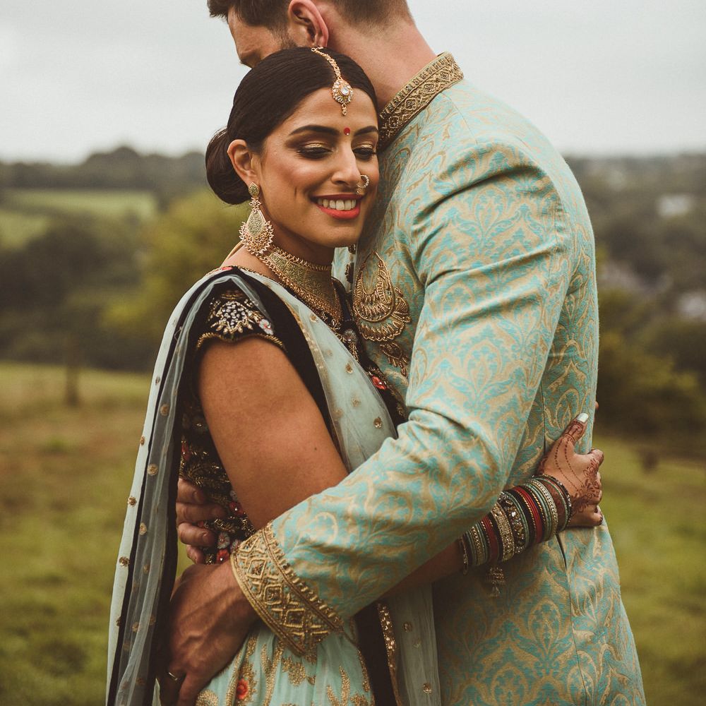 Bride &amp; Groom in Traditional Indian Wedding Attire | Fusion Rustic Indian Country Wedding at The Green Cornwall | Matt Penberthy Photography
