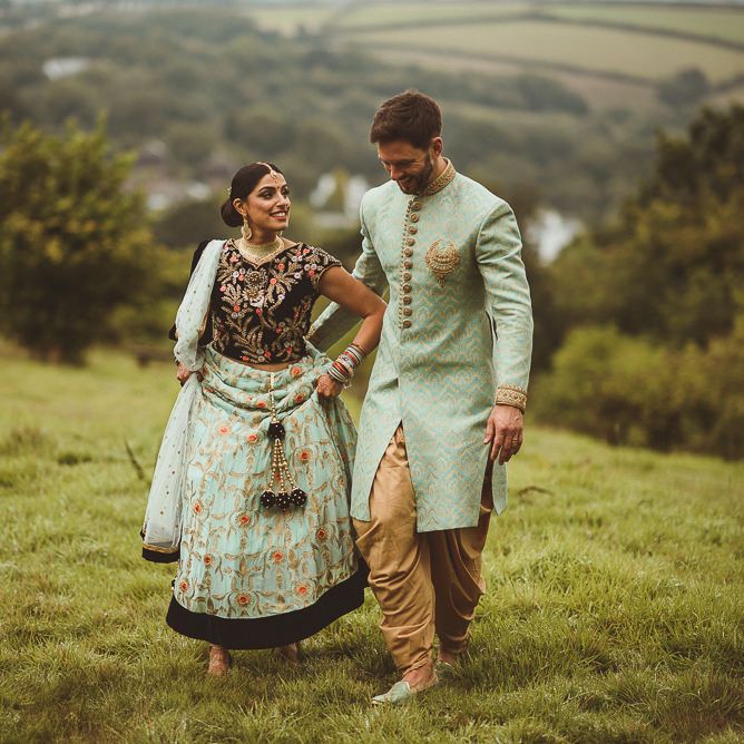 Bride &amp; Groom in Traditional Indian Wedding Attire | Fusion Rustic Indian Country Wedding at The Green Cornwall | Matt Penberthy Photography