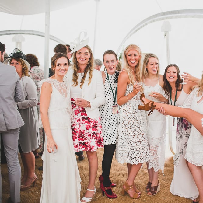Rainy Festival Wedding In East Sussex With Bride In Rime Arodaky And Black Biker Boots And Bridesmaids In White Dresses With Silent Disco Party Images By Jesus Caballero