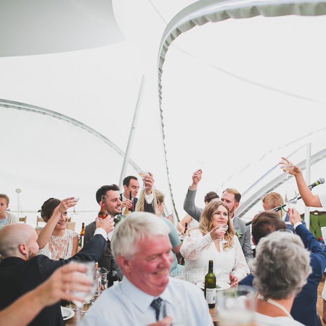 Rainy Festival Wedding In East Sussex With Bride In Rime Arodaky And Black Biker Boots And Bridesmaids In White Dresses With Silent Disco Party Images By Jesus Caballero
