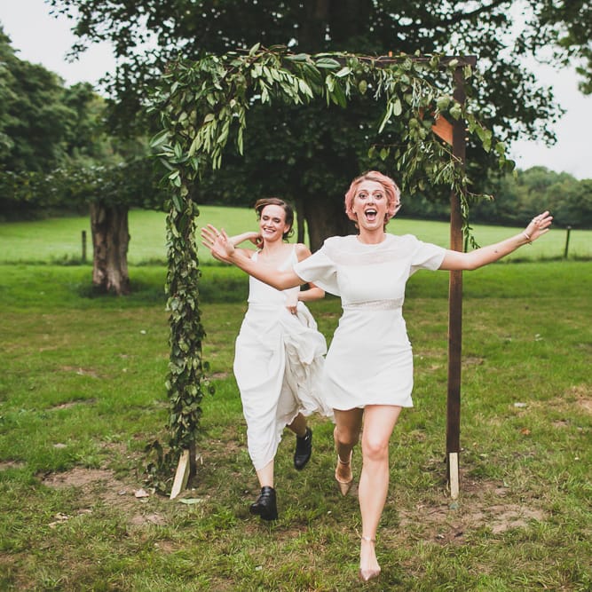 Rainy Festival Wedding In East Sussex With Bride In Rime Arodaky And Black Biker Boots And Bridesmaids In White Dresses With Silent Disco Party Images By Jesus Caballero