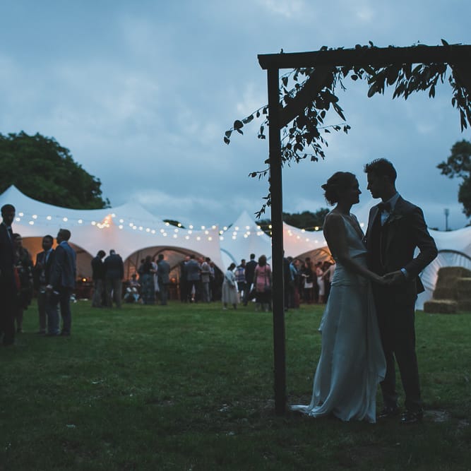 Rainy Festival Wedding In East Sussex With Bride In Rime Arodaky And Black Biker Boots And Bridesmaids In White Dresses With Silent Disco Party Images By Jesus Caballero