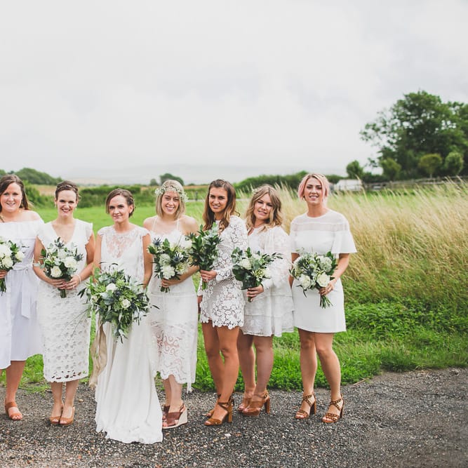 Rainy Festival Wedding In East Sussex With Bride In Rime Arodaky And Black Biker Boots And Bridesmaids In White Dresses With Silent Disco Party Images By Jesus Caballero