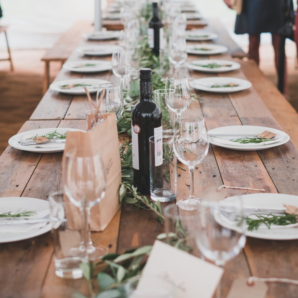 Foliage Runner For Wooden Trestle Table // Rainy Festival Wedding In East Sussex With Bride In Rime Arodaky And Black Biker Boots And Bridesmaids In White Dresses With Silent Disco Party Images By Jesus Caballero