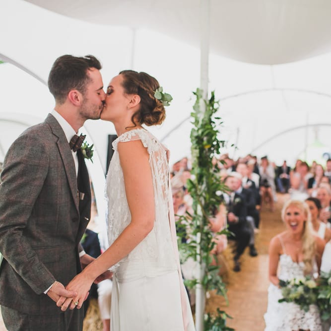 Rainy Festival Wedding In East Sussex With Bride In Rime Arodaky And Black Biker Boots And Bridesmaids In White Dresses With Silent Disco Party Images By Jesus Caballero