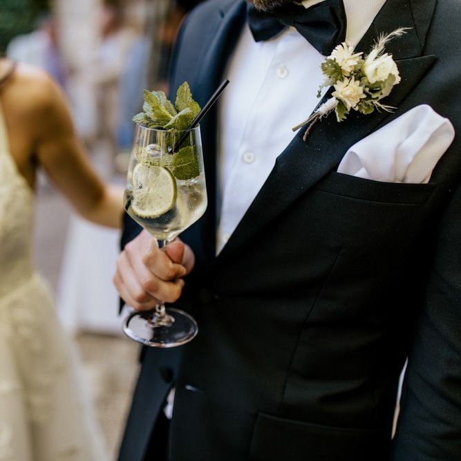 Bride and Groom Enjoying a Gin and Tonic Drinks Reception