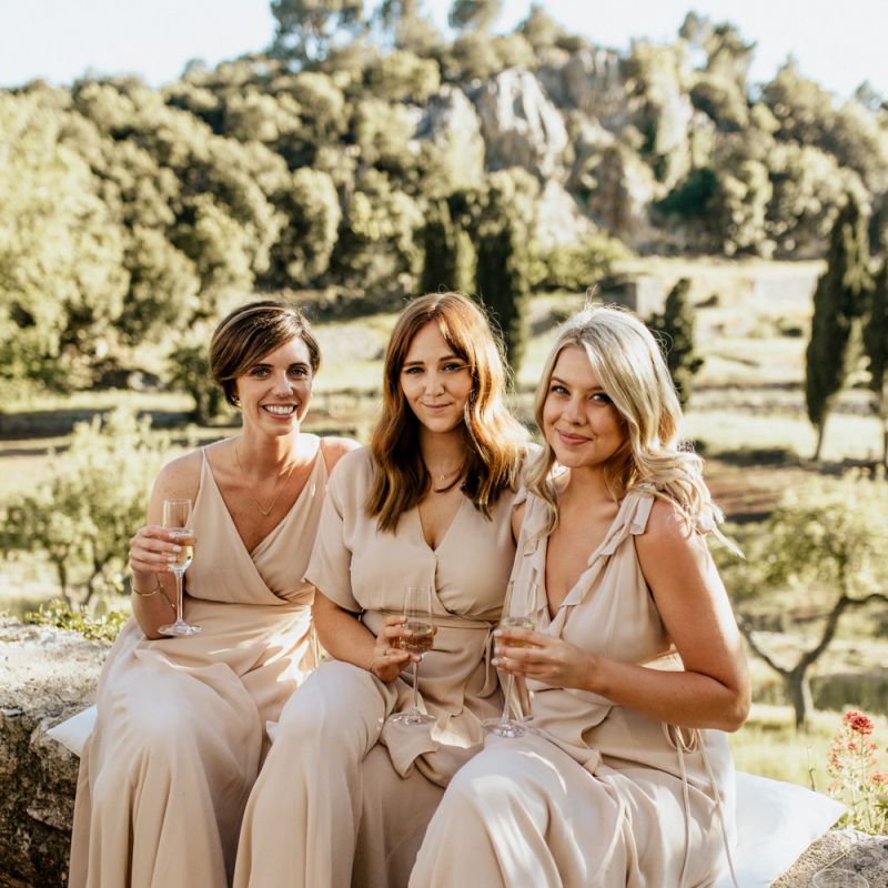 Bridesmaids in Reformation Dresses