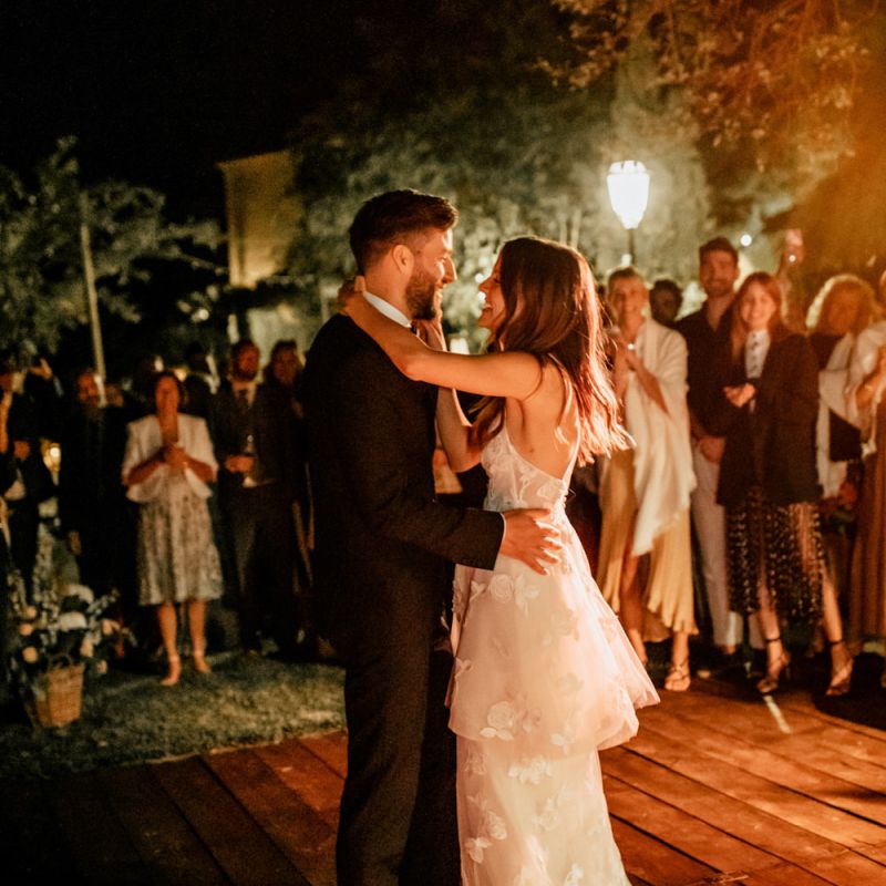 First Dance with Bride in Tiered Lace Emma Beaumont Wedding Dress and Denim Jacket and Groom in Givenchy Tuxedo