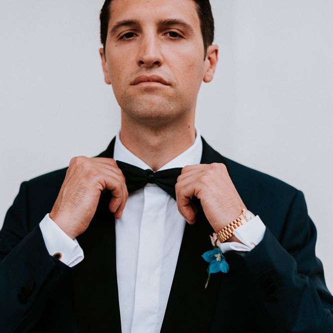 Groom in black tuxedo for Italian wedding