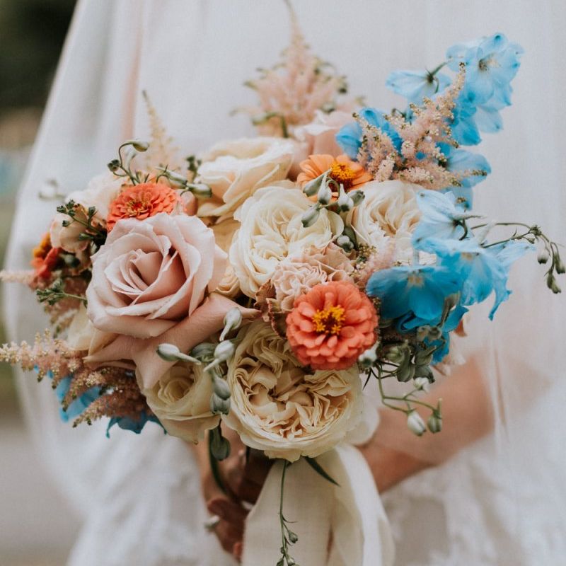 Pastel bouquet with pops of blue and pinks