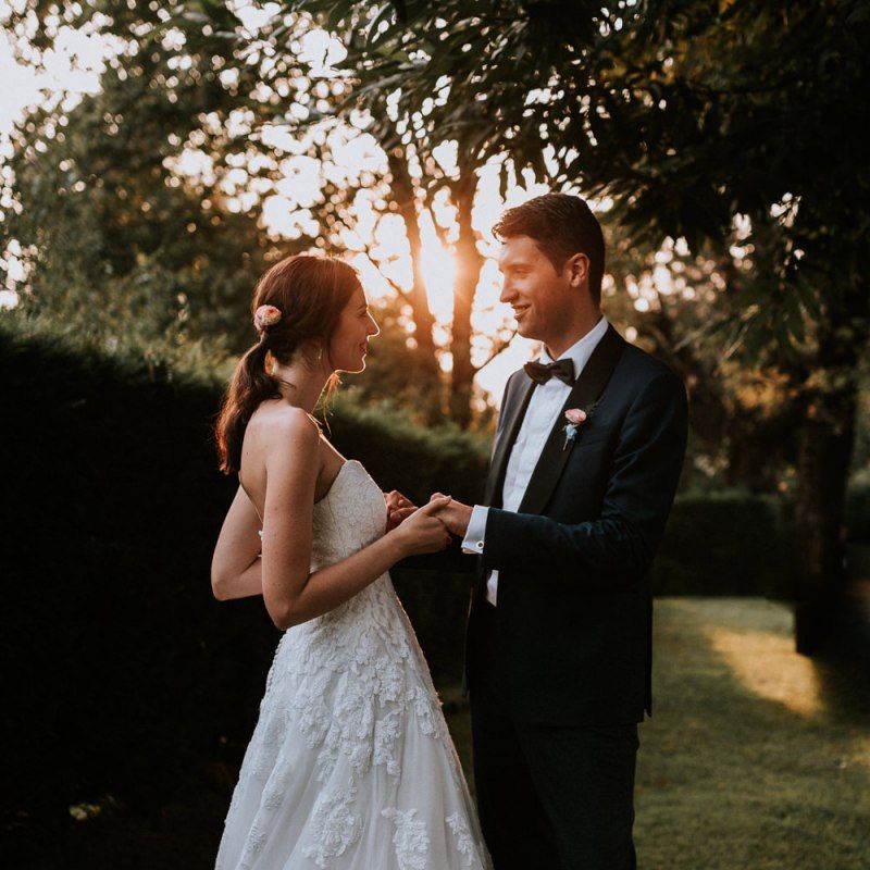 Bride in lace strapless wedding dress from Pronovias