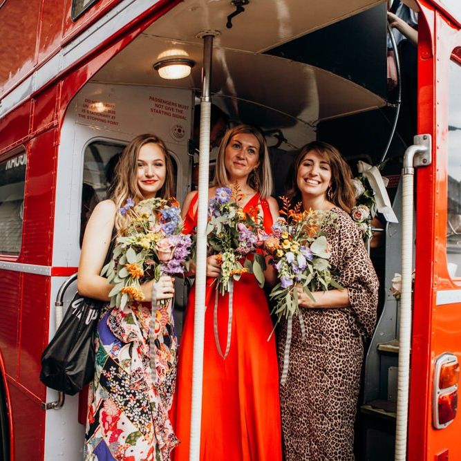 Mismatched Bridesmaid Dresses with Bridal Party on Wedding Transport Bus