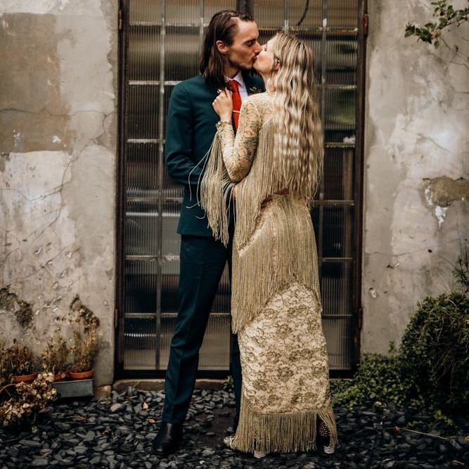 Bride and Groom Embrace Kiss