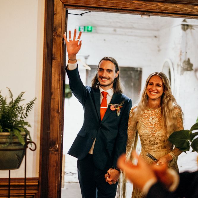 Bride and Groom Entering Ceremony Room
