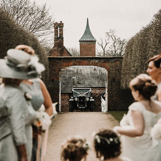 Bridal Entrance in Hourglass Essense of Australia Wedding Dress for a Sophisticated Wedding at Combermere Abbey, Cheshire | Carla Blain Photography