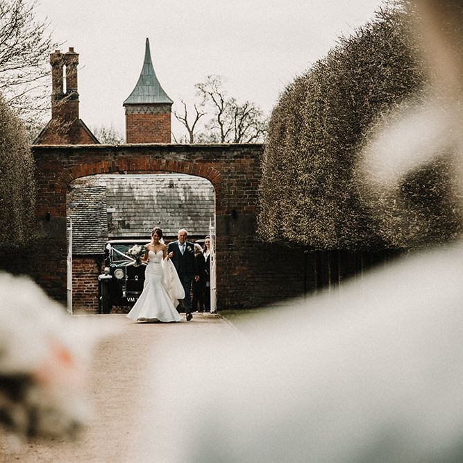 Bridal Entrance in Hourglass Essense of Australia Wedding Dress for a Sophisticated Wedding at Combermere Abbey, Cheshire | Carla Blain Photography